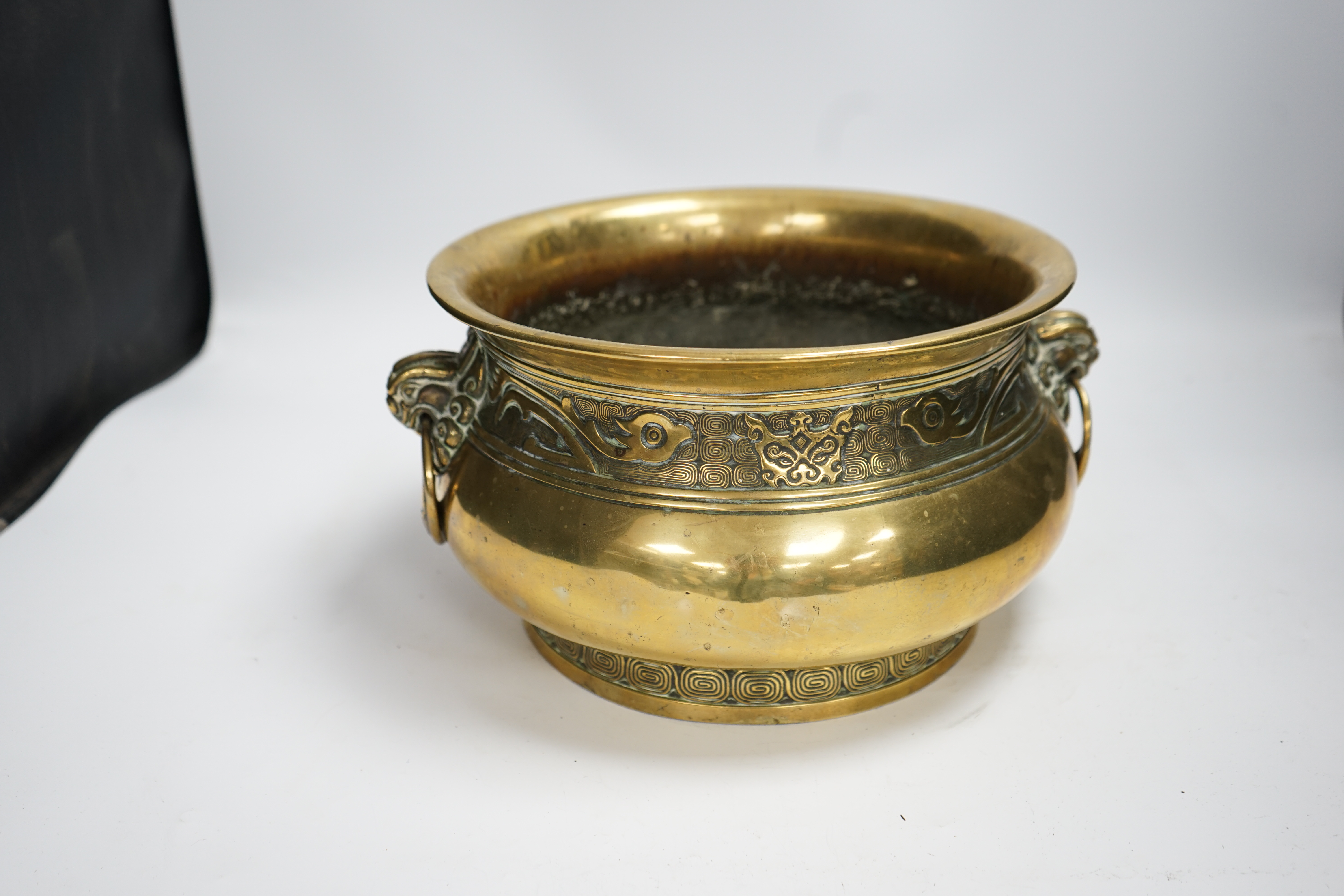 A large Chinese bronze censer, Xuande mark to base, 31cm across